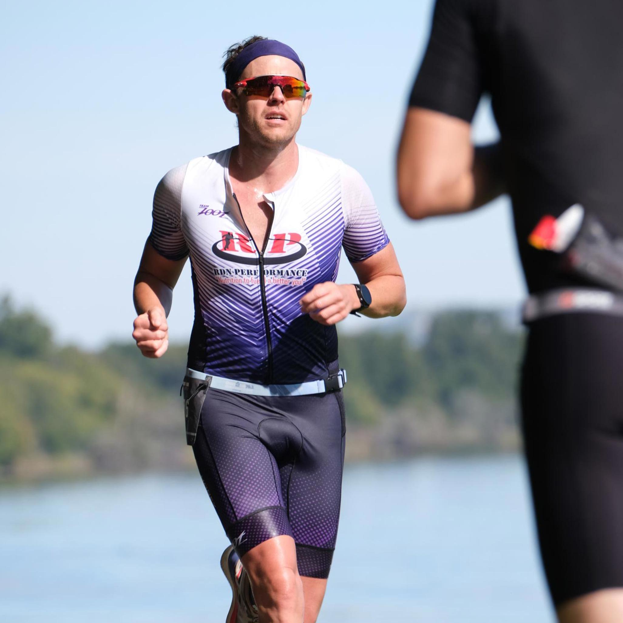 Dr. Hawes on the run course of a triathlon